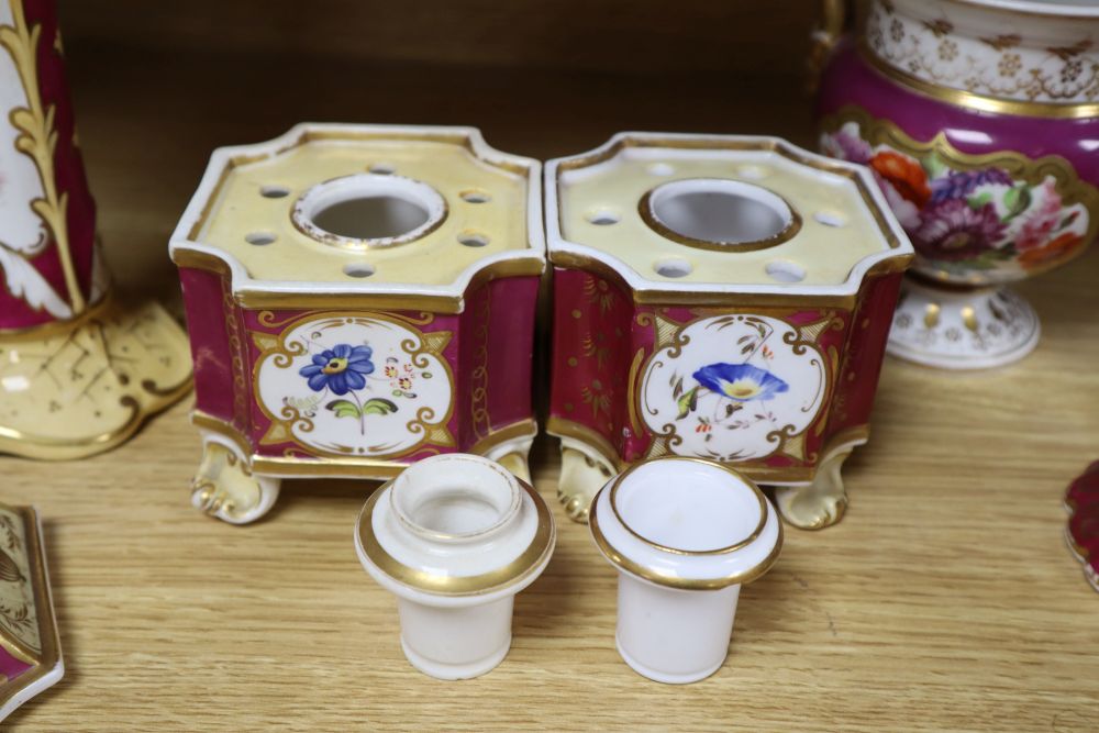 A group of English porcelain ruby ground vessels, c. 1825-45,